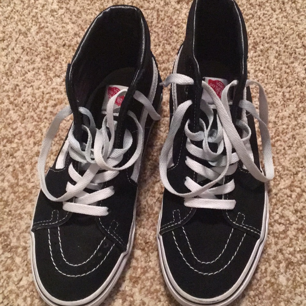 Black and white High-Top vans